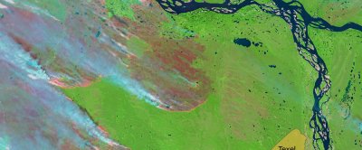 Een Sentinel-2 satellietbeeld van een groot brandcomplex in het noordoosten van Siberië, genomen op 7 augustus 2021 (het eiland Texel is ingetekend ter illustratie van de schaal). Deze branden waren meerdere weken actief. Credit: Copernicus Sentinel-2-beeldmateriaal, met dank aan ESA.